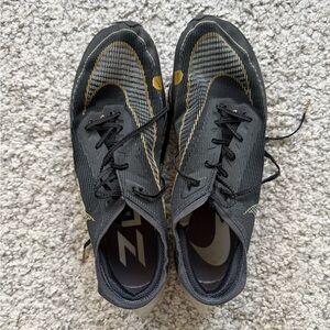 Men's Black and Gold Athletic Nike ZoomX Vaporfly size 11.5